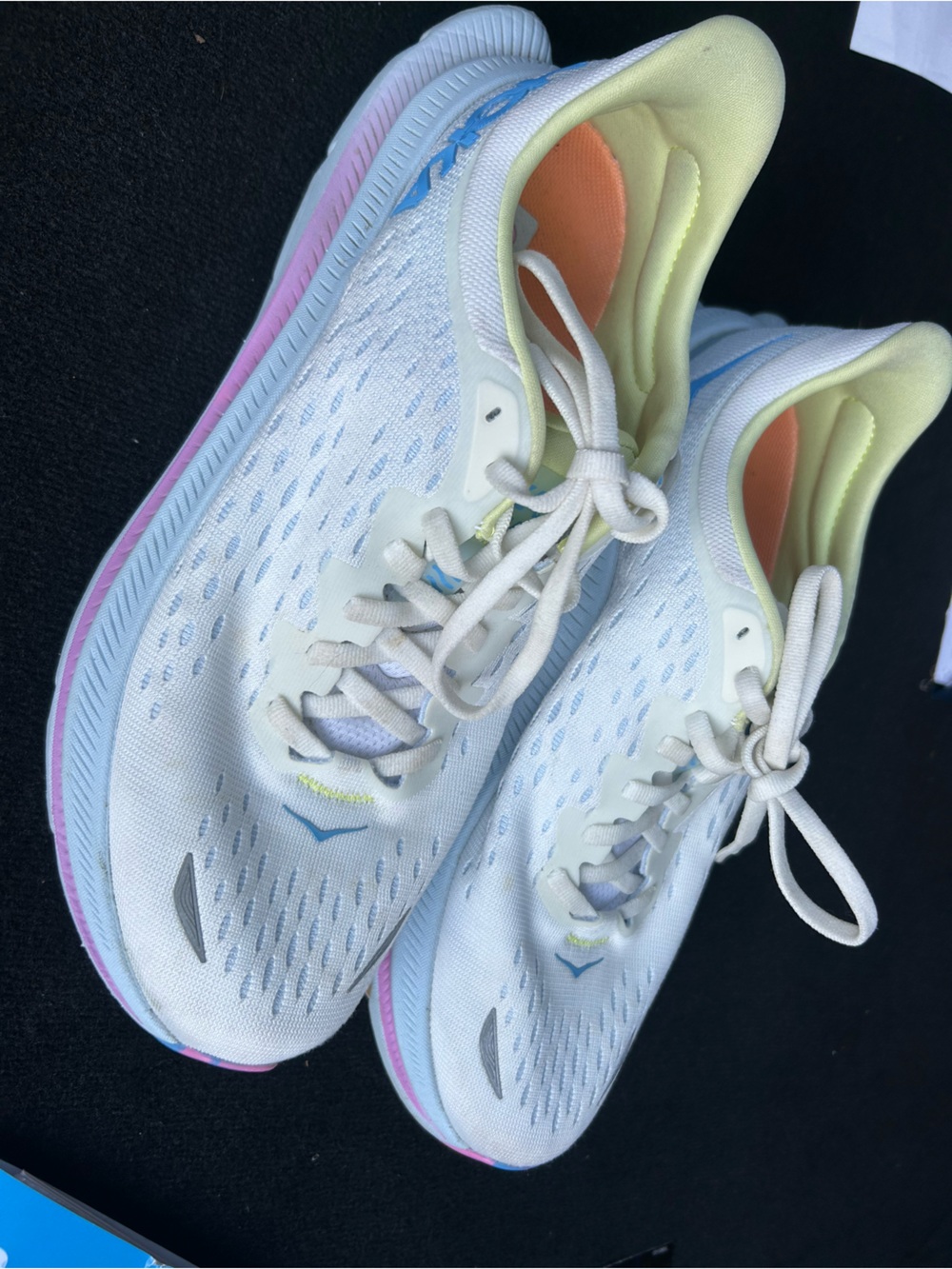 Hoka One One Women's White Running Shoes with Pastel Blue, Pink & Yellow Accents